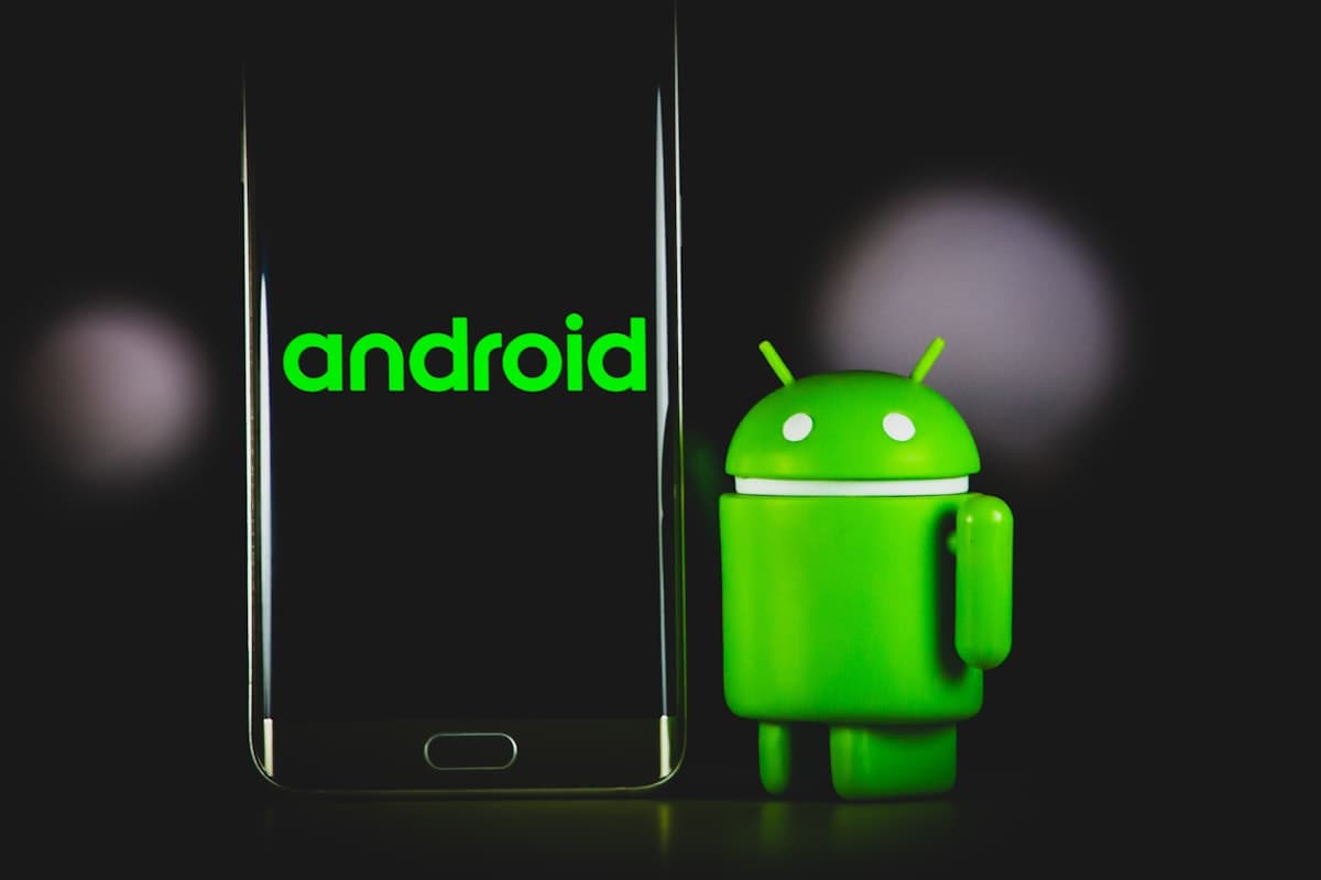 Android phone settings screen in a user's hand